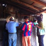 Palenquero Wilfreido Garcia Martinez (right) palenquero of the Palenque Roaguia describes his fermentation process