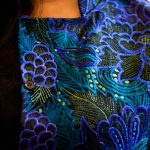 Detail of the intricate stitching in Gloria Dominguez's outfit. Photo: Erin Conger