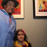 Artist Calixto Robles and his daughter