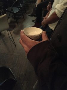 An audience member samples during the presentation.
